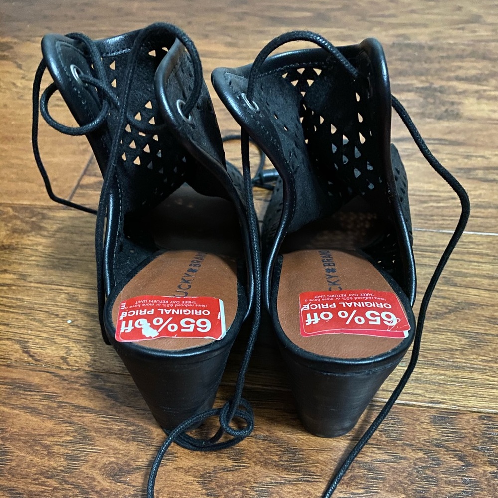 Lucky brand shoes. Never worn! tie in the back